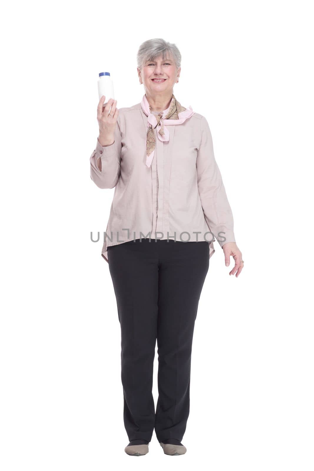 in full growth. smiling old woman with hand sanitizer. isolated on a white background.