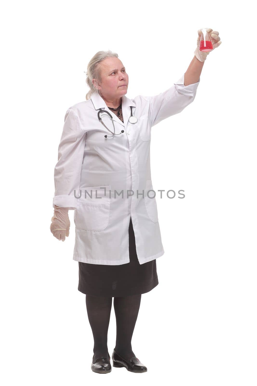 female scientist holding test tube with blood sample making research in clinical laboratory. Science, chemistry, biology, medicine and people concept