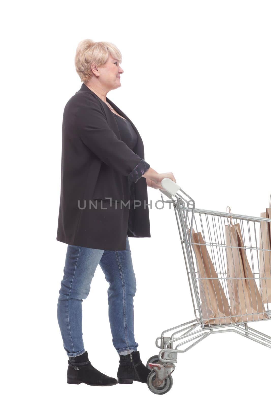 full-length. casual mature woman with shopping cart . isolated on a white background.