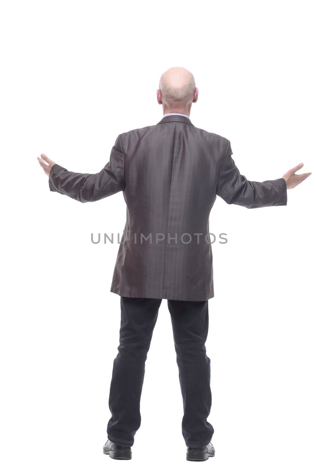 rear view.Mature business man . isolated on a white background.