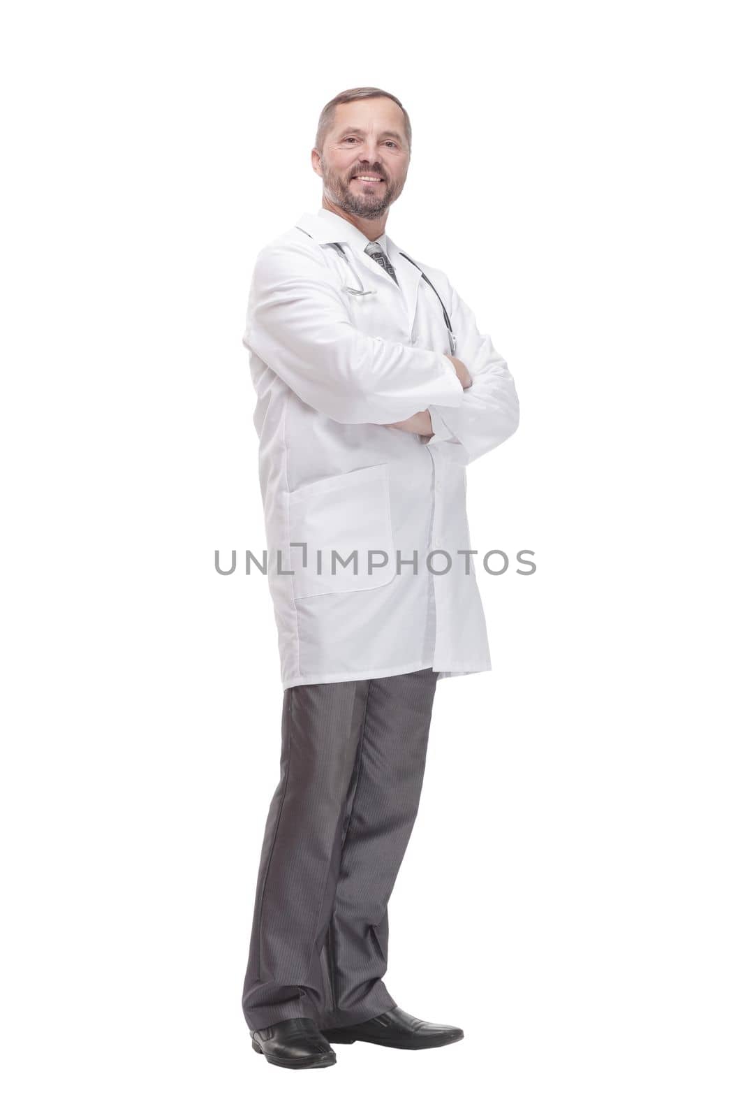 full-length. Mature male doctor. isolated on a white background.