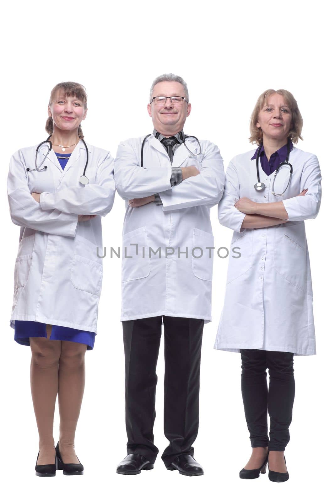 Medical team wearing white coat looking at camera, smiling