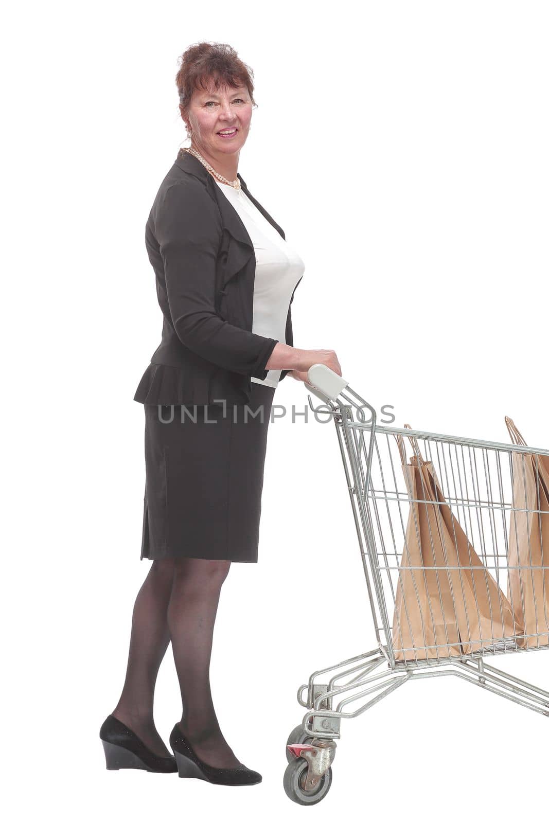 Full length portrait of a woman pushing a shopping trolley by asdf