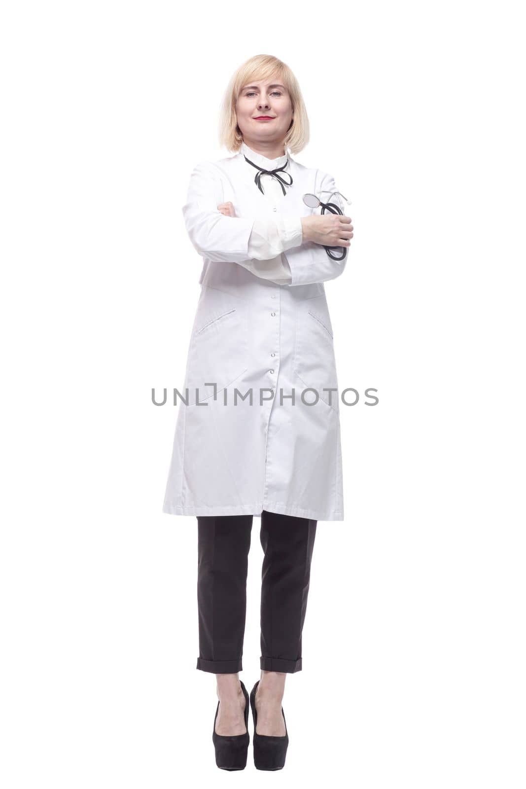 qualified female doctor with a stethoscope in her hands. isolated on a white background.