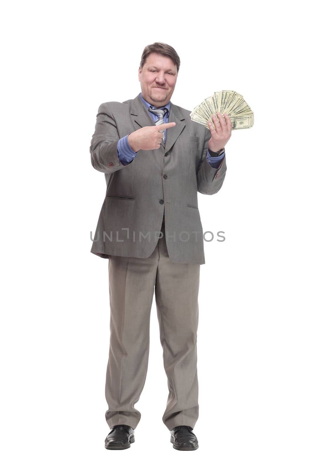 in full growth. happy man with dollar bills. isolated on a white background.