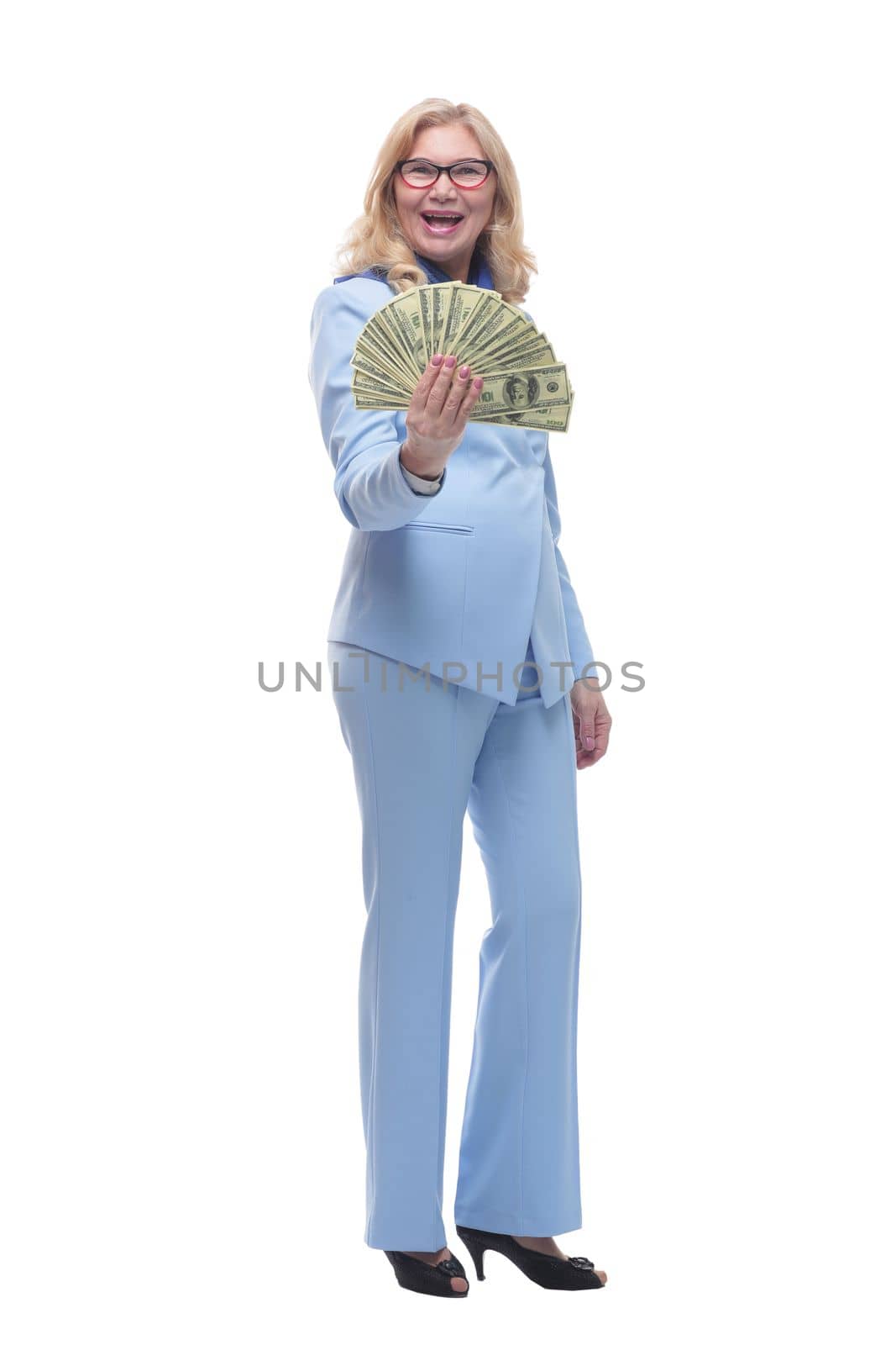 in full growth. smiling woman with a bundle of banknotes. by asdf