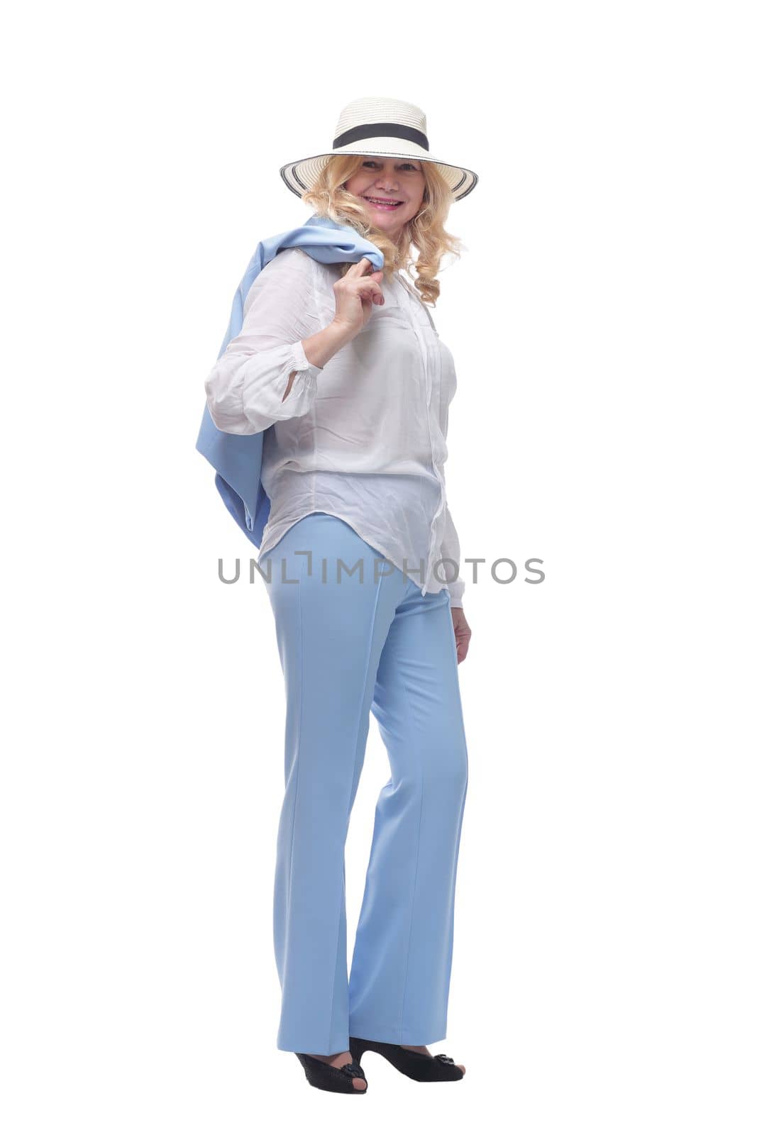 in full growth. happy fashionable woman in a summer hat . isolated on a white background.