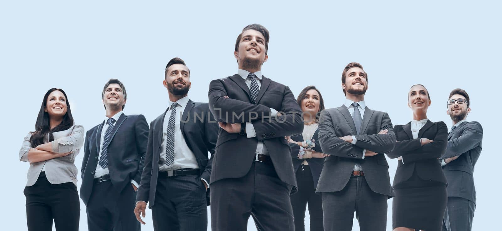 Portrait of friendly business team standing in isolation