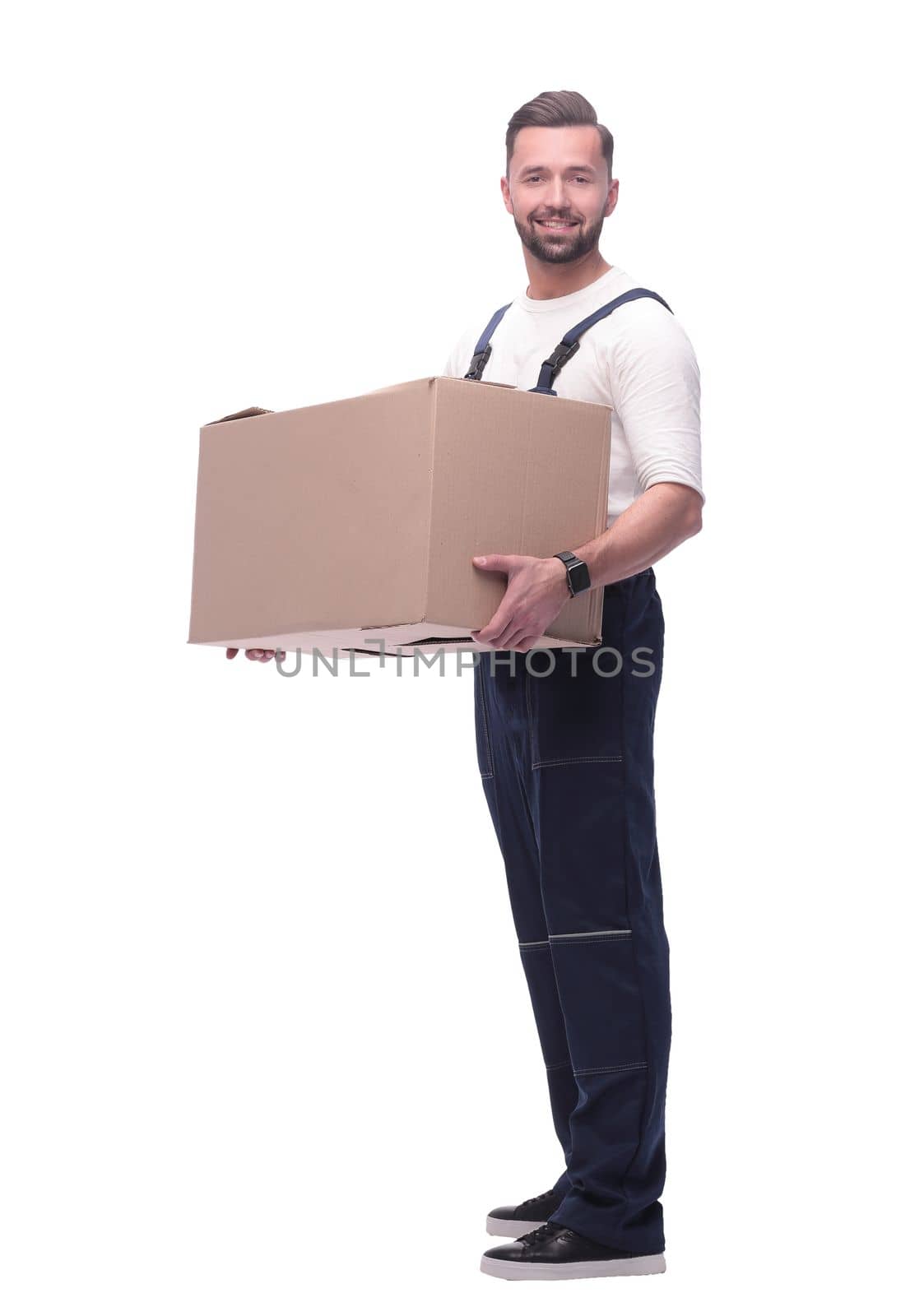 in full growth.man in workwear with cardboard box isolated on white background