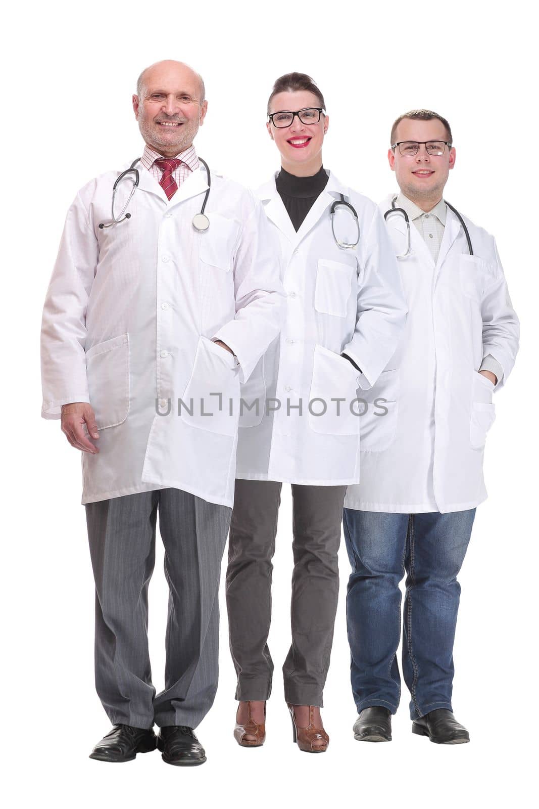 Portrait of group of smiling hospital colleagues standing together. Healthcare and medicine concept