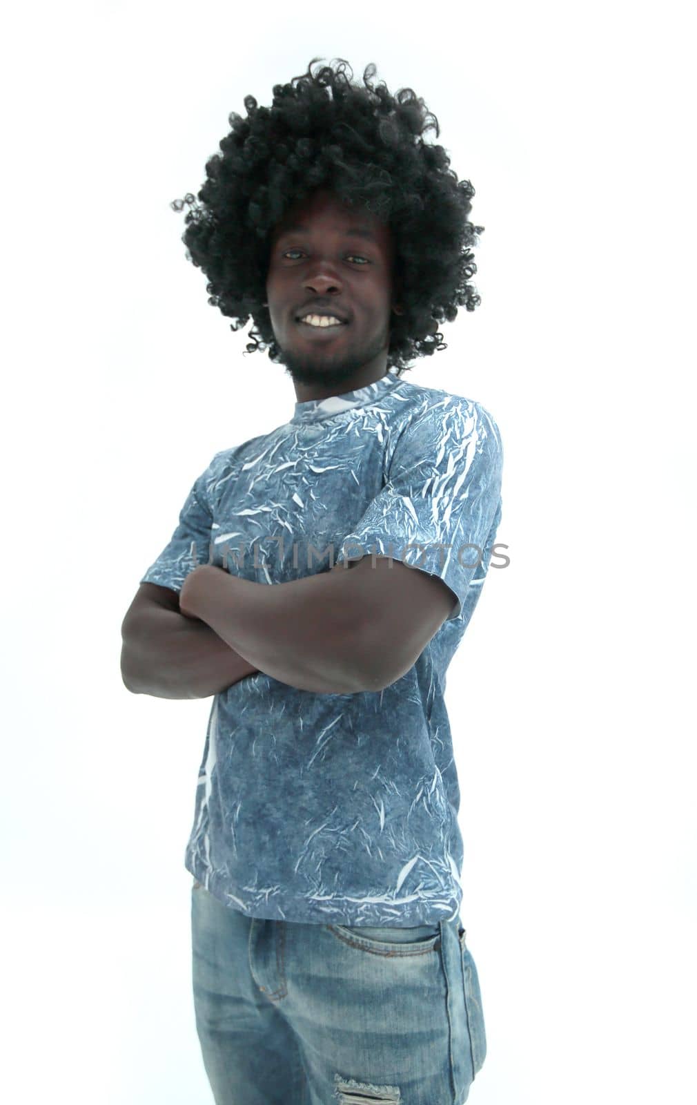 funny curly haired guy looking at the camera. isolated on white background
