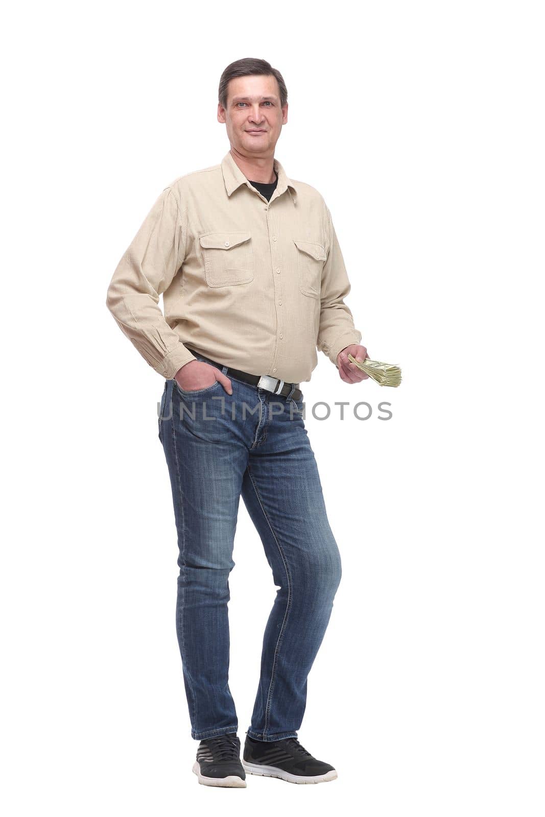 Front view portrait of a happy business man holding money, isolated on white