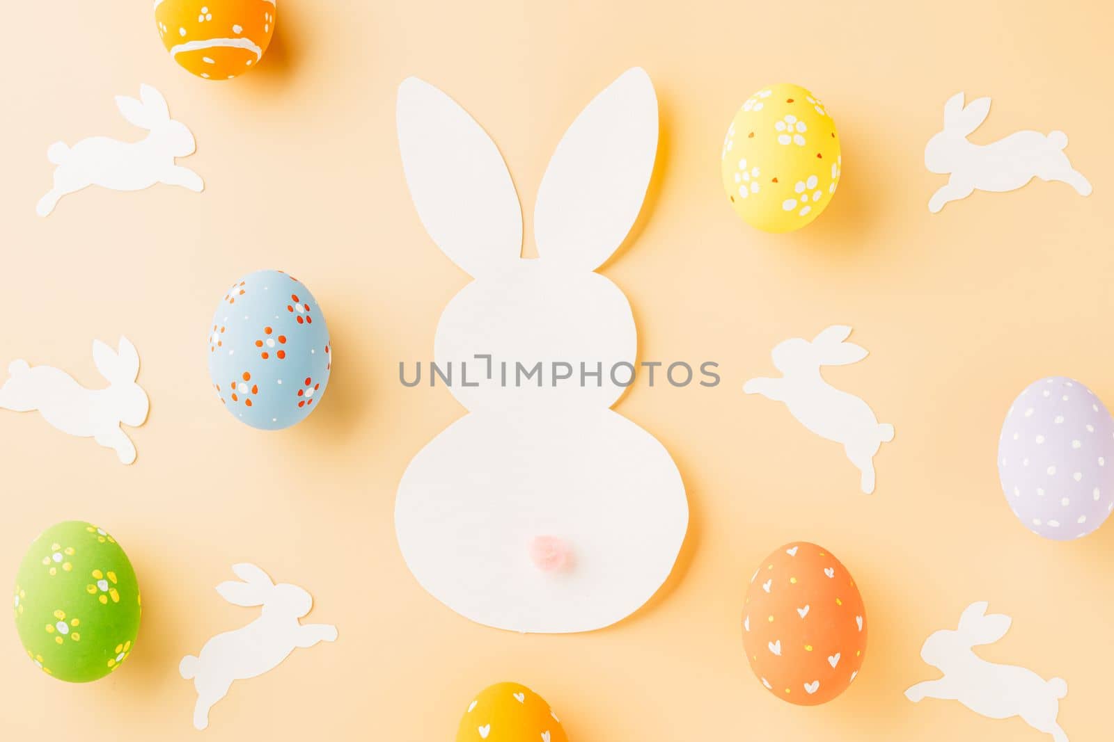 Easter eggs bunny and rabbit white paper cut isolated on pastel background copy space, Funny decoration, Creative composition banner web design holiday background, Happy Easter Day, flat lay top view