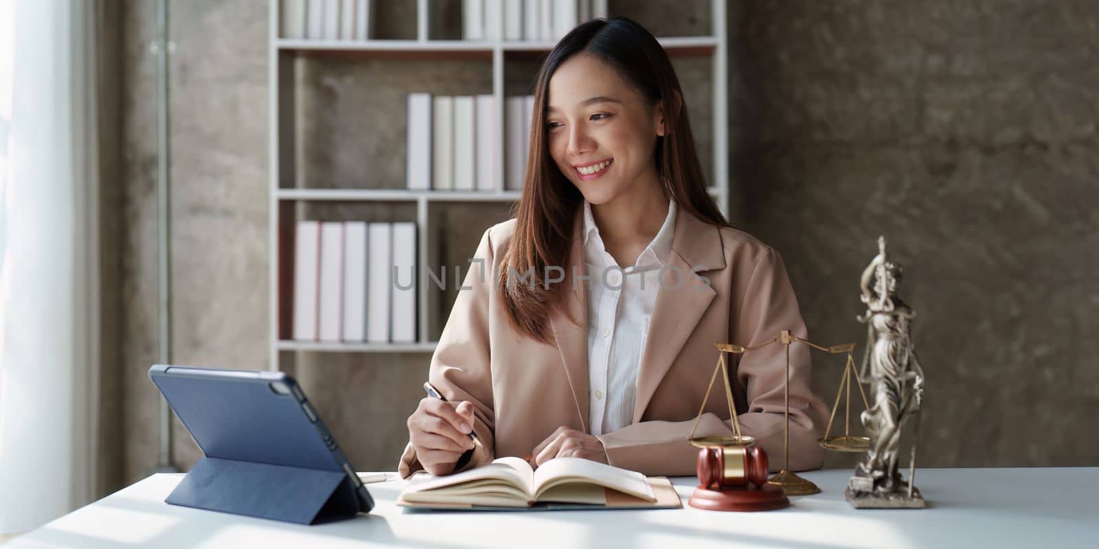 Beautiful business lawyers working with agreement contract in office. Law, legal services, advice, Justice concept by itchaznong