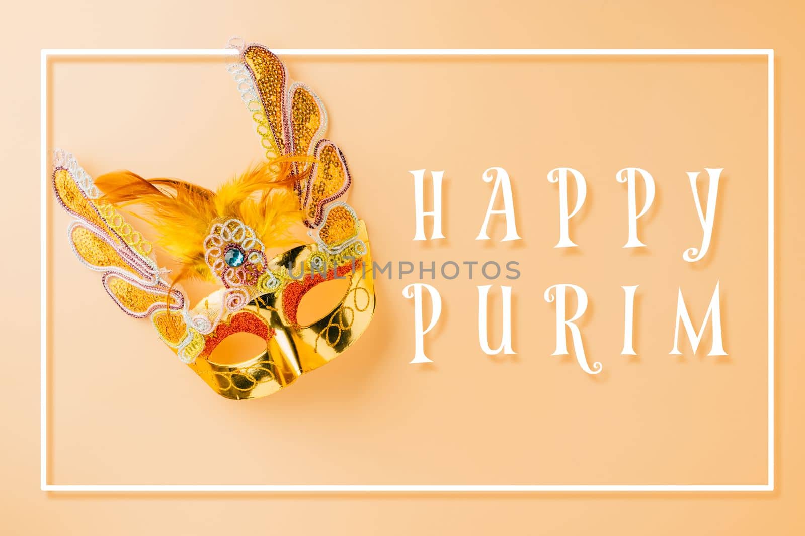 Happy Purim carnival decoration. Golden venetian ball mask isolated on pastel background with copy space, Jewish Purim or Mardi Gras in Hebrew, celebration holiday background banner design