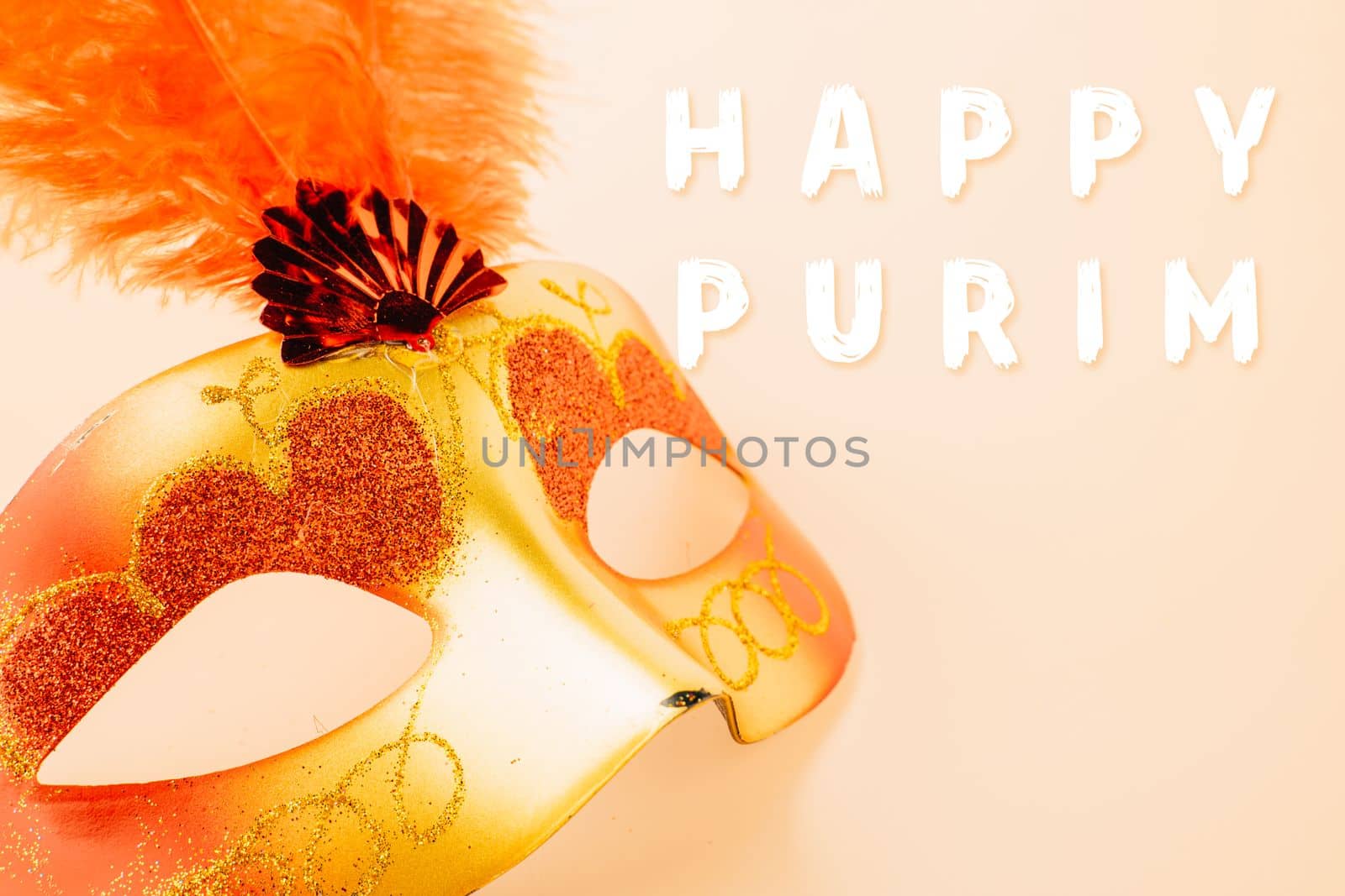 Happy Purim carnival decoration. Top view venetian ball mask with red feather on pastel background, Jewish Purim or Mardi Gras in Hebrew, holiday background banner design, Masquerade party