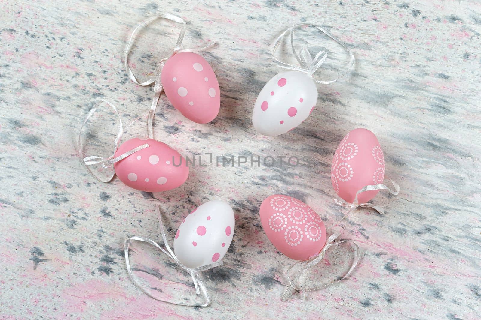 Colorful easter eggs. Background with easter eggs on wooden paint brush effect by JPC-PROD