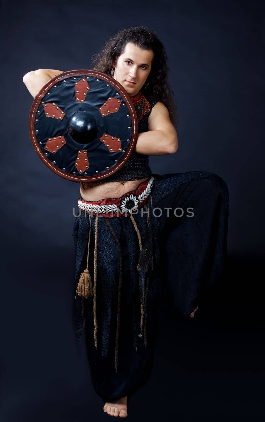 Man dance with buckler - arabian costume