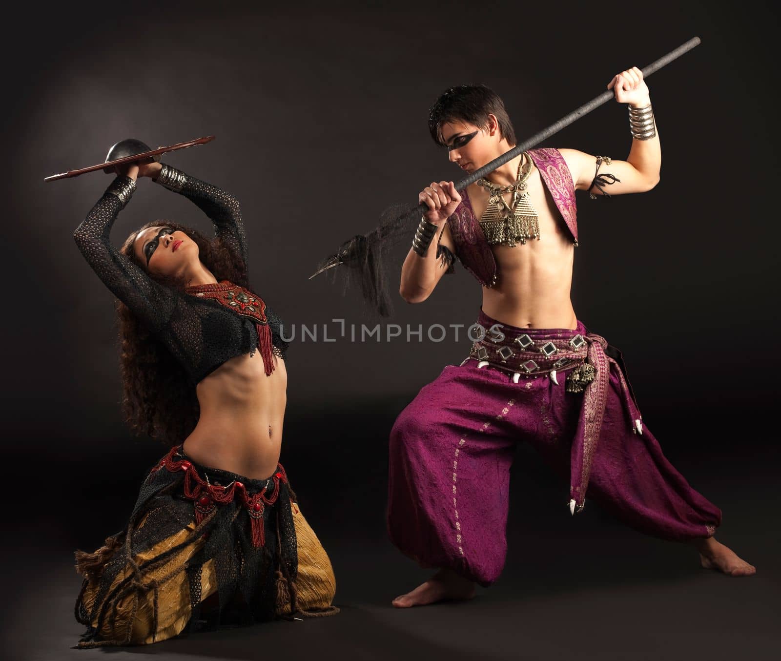 ritual scene with shield and spear - traditional arabia costume