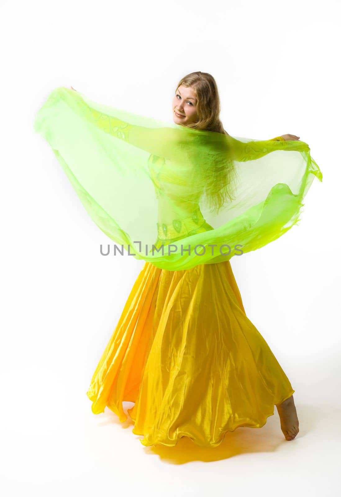young girl dance with green veil on white