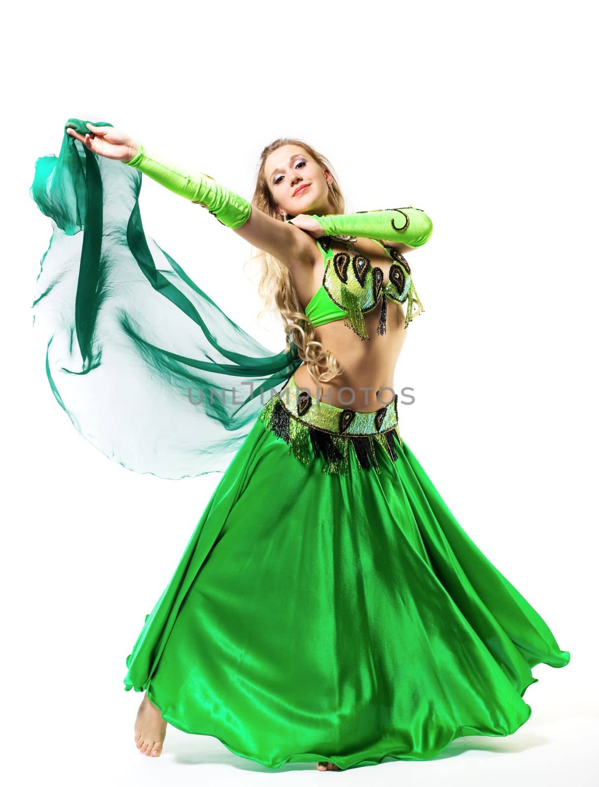 young girl dance with green veil - traditional arabic costume