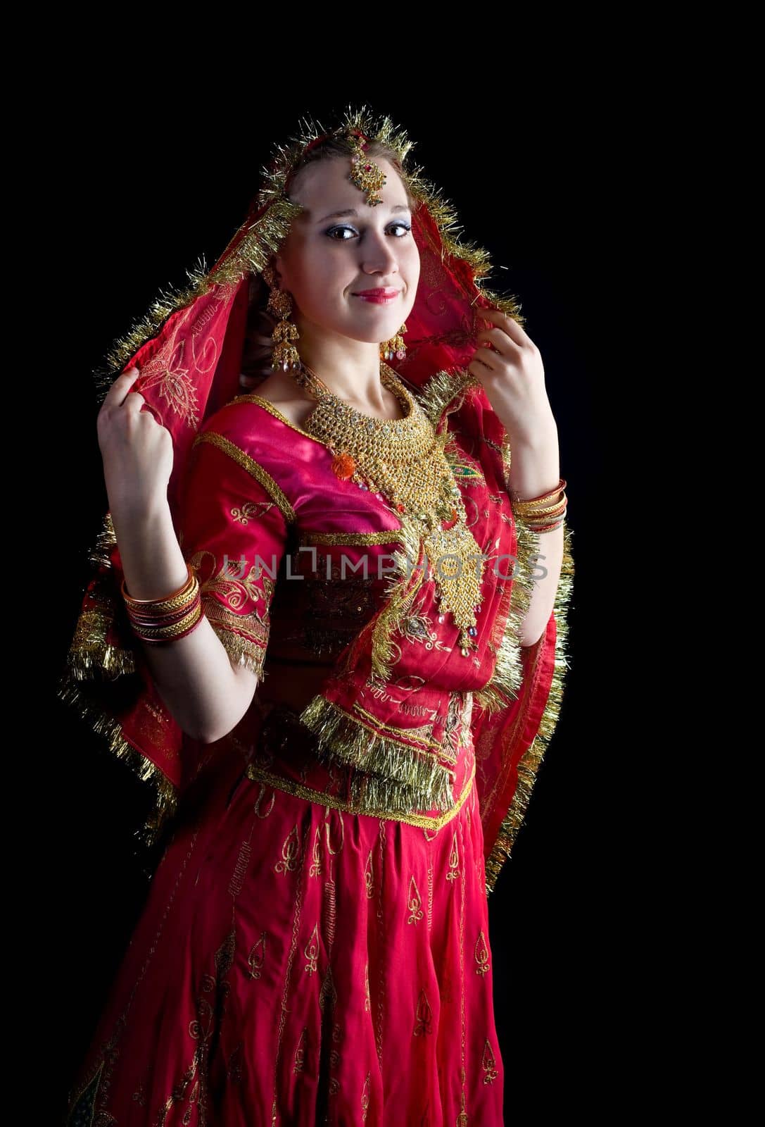 young woman look at you - traditional red indian costume