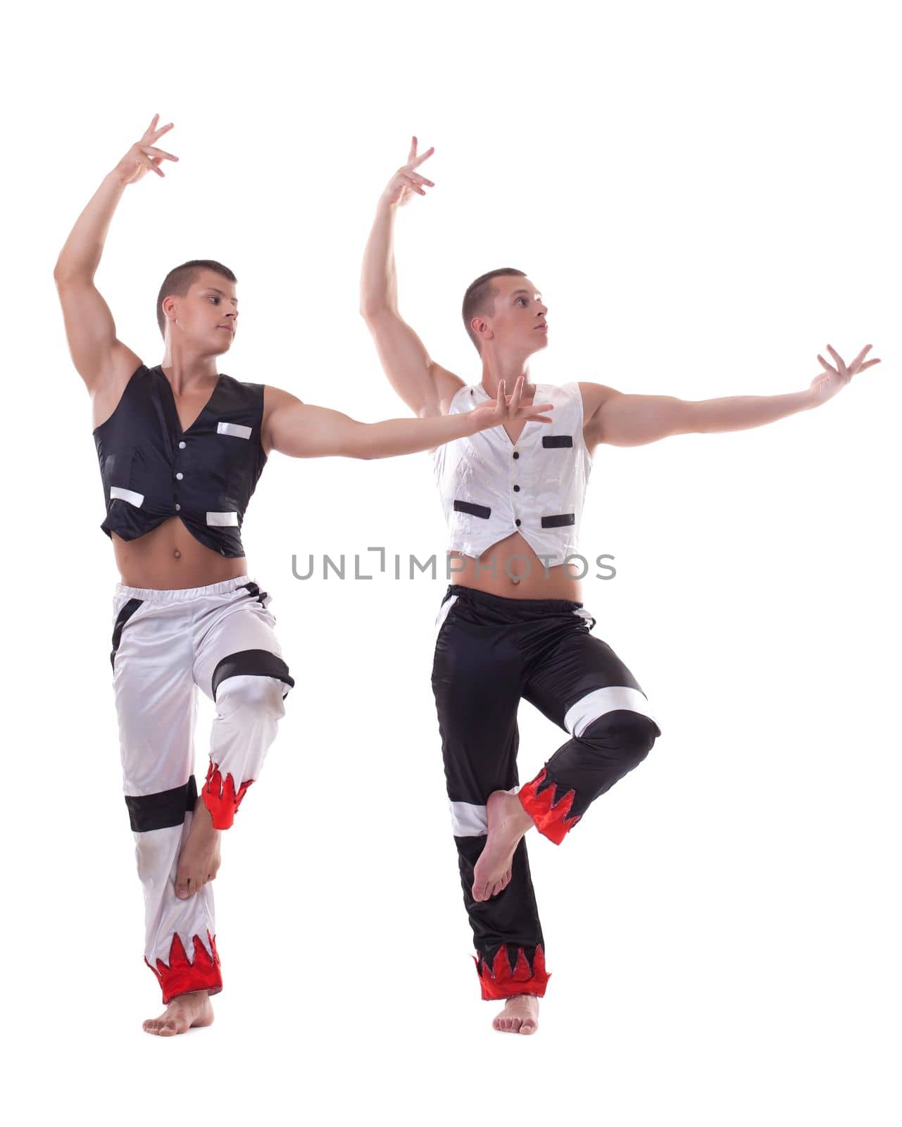 Handsome young guys dancing in studio, isolated on white