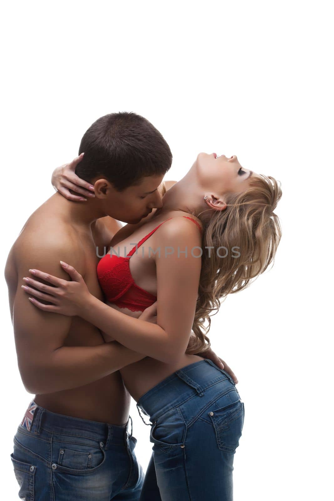 Athletic beauty man kiss sexy girl in red bra by rivertime