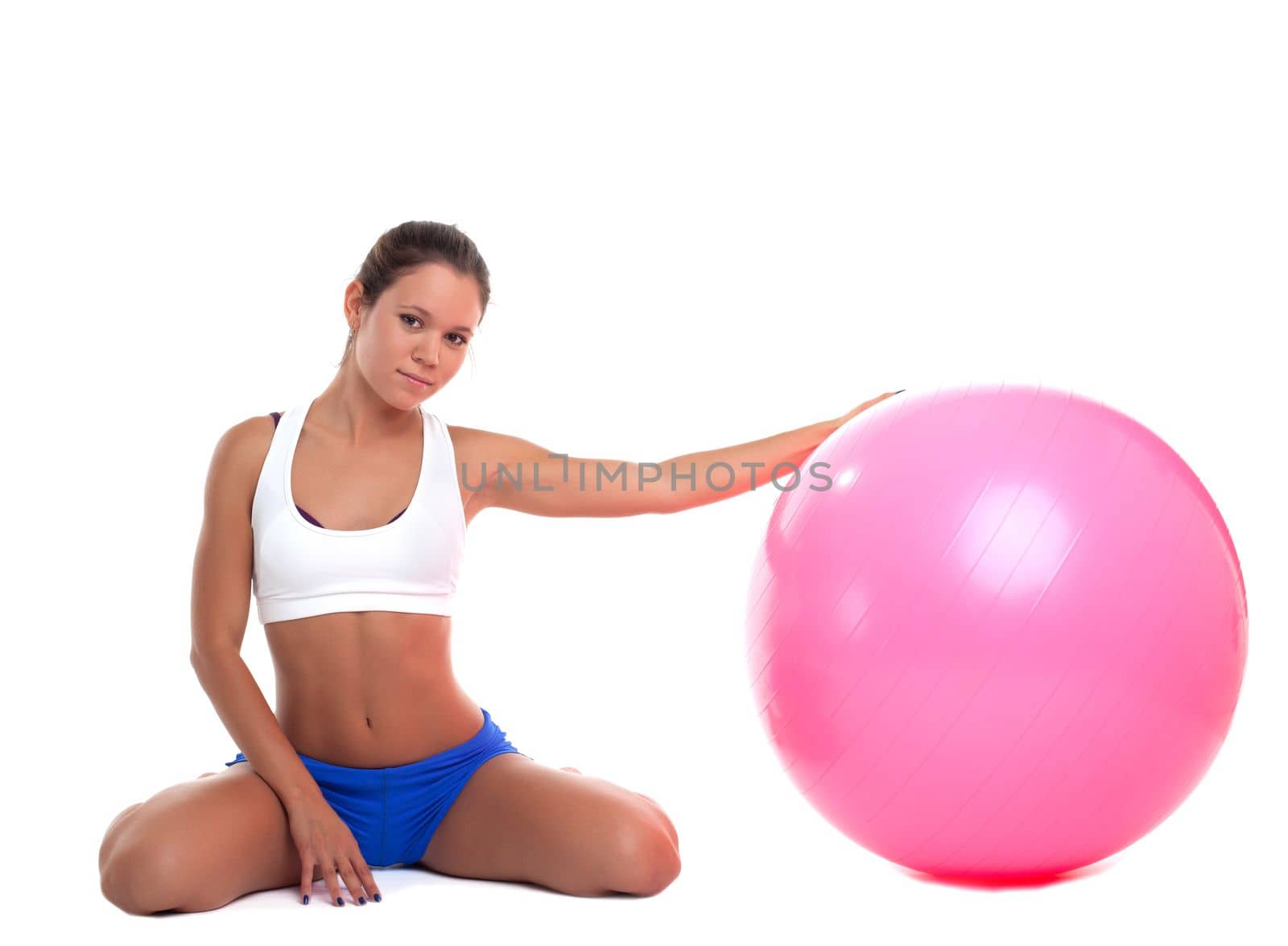 young beauty woman relax with fitness ball isolated