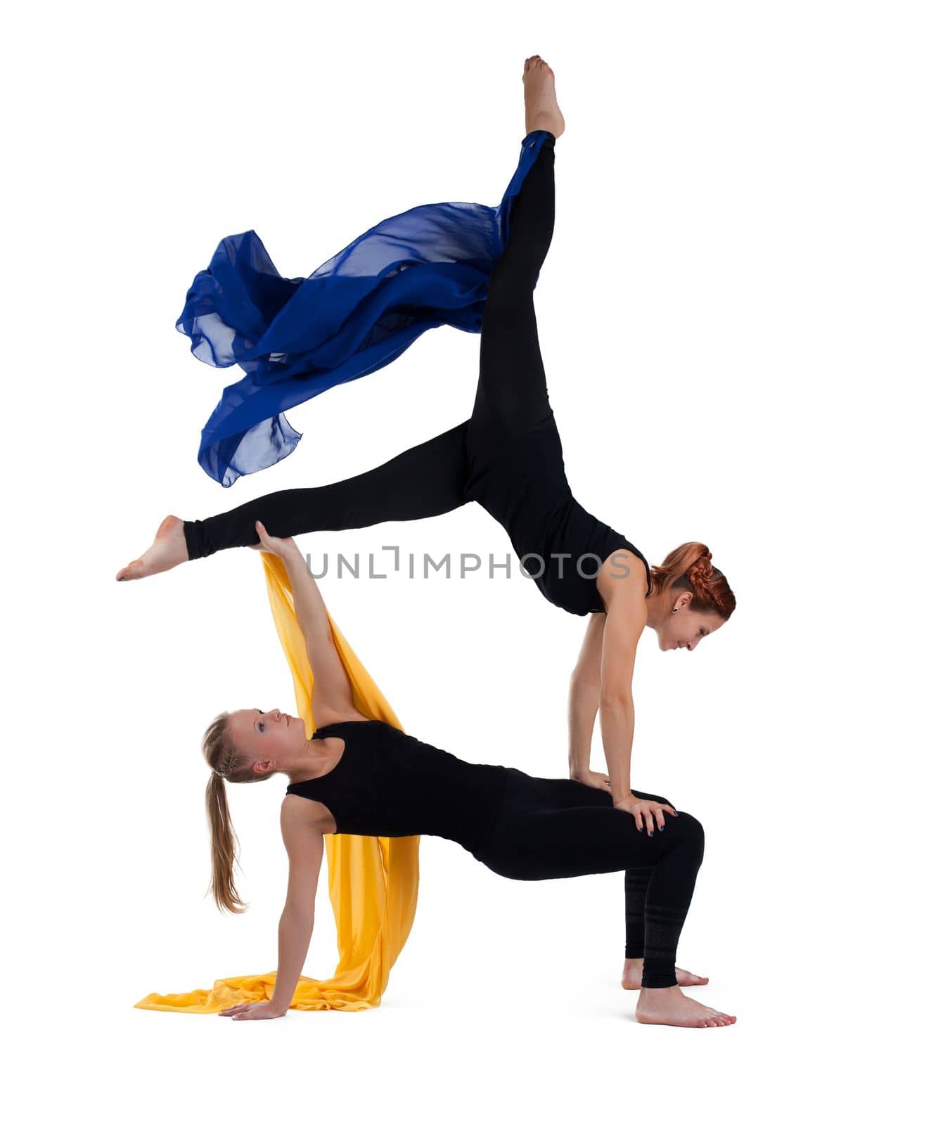two woman gymnast posing with flying cloth isolated
