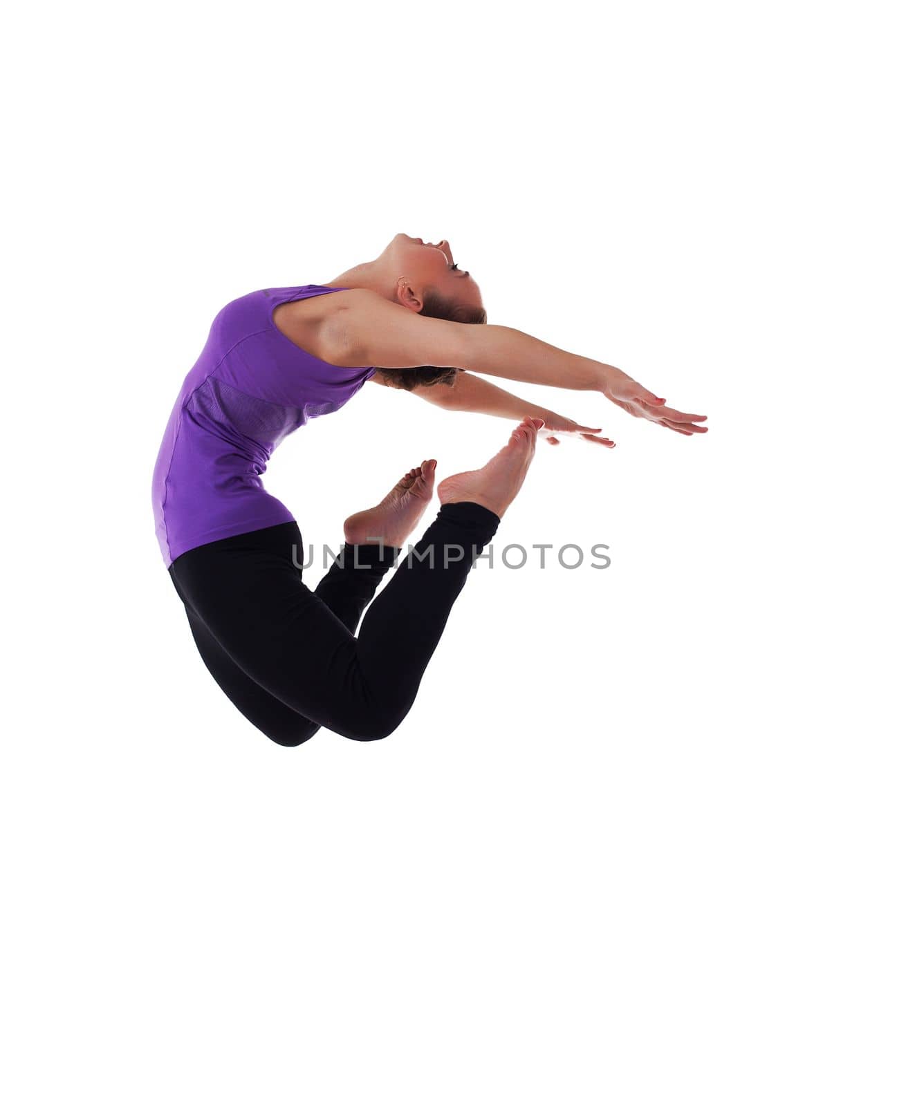 woman duing high jump in fitness costume isolated