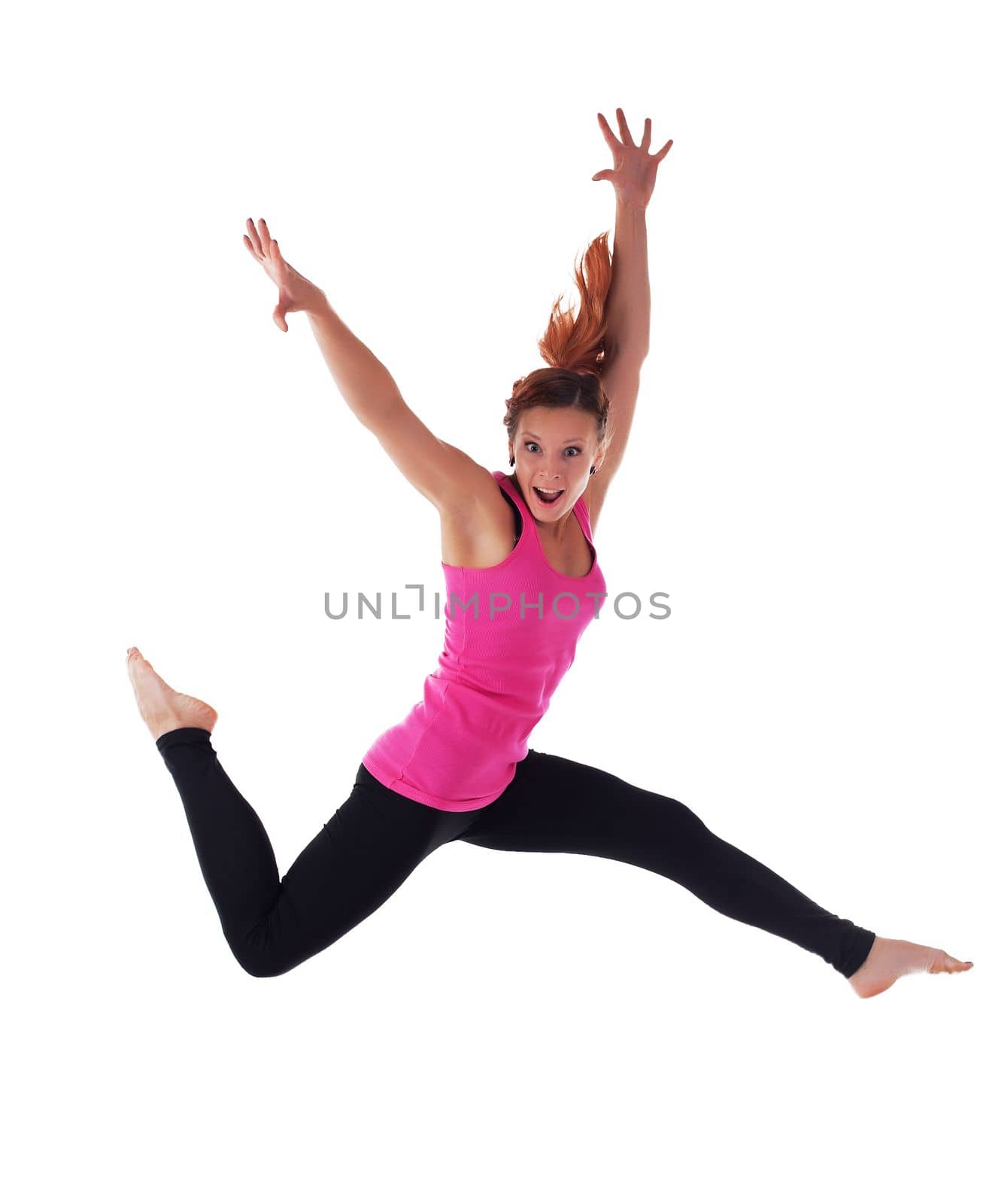 Young athletic woman doing hight jump run in air isolated