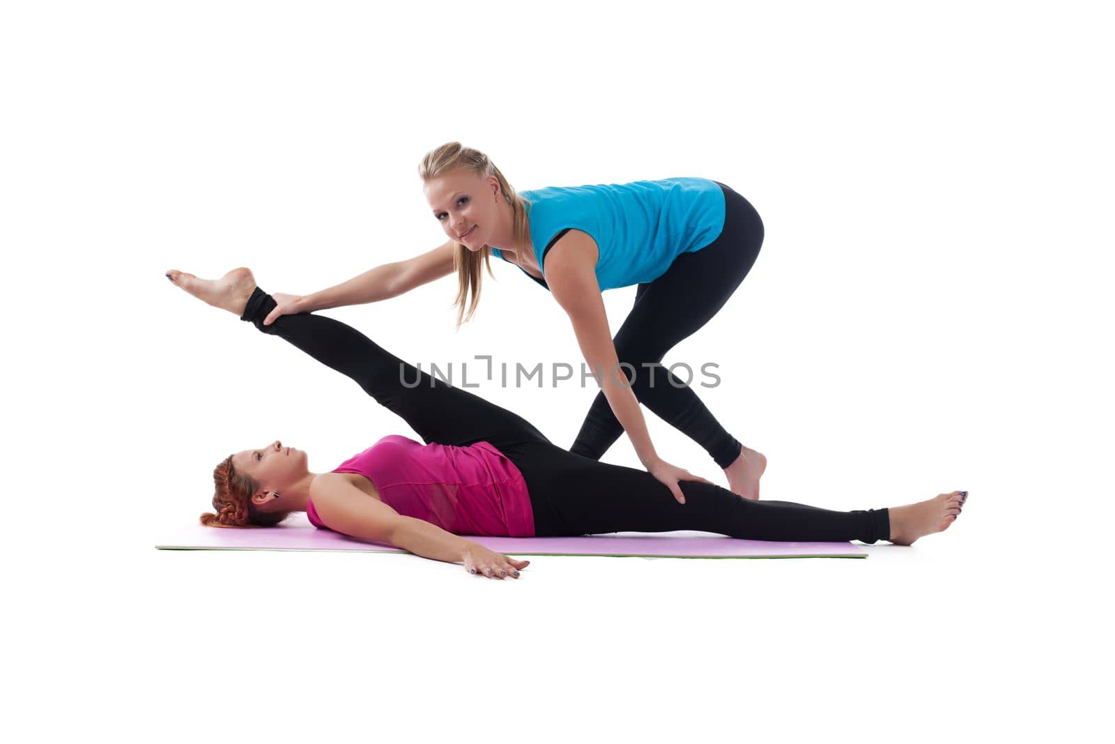 fitness trainer help woman exercise stretch by rivertime