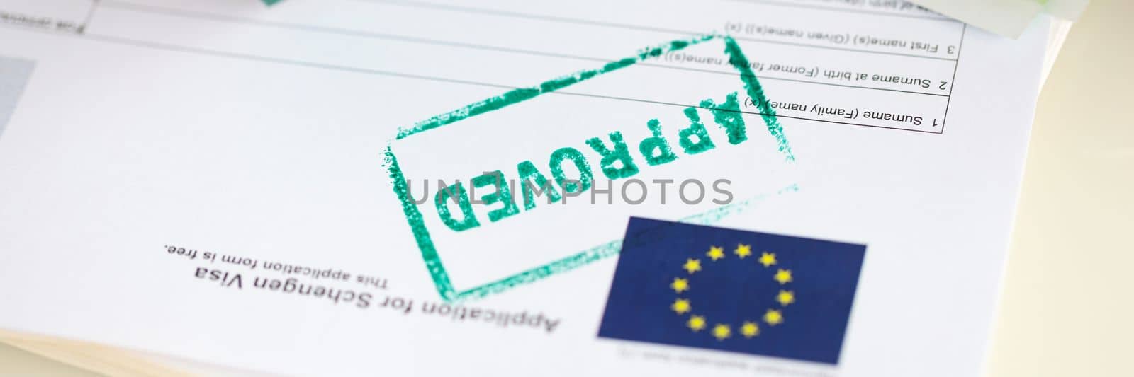 Approved EU visa application and cash euro banknotes. Obtaining visa to Europe and moving to European country