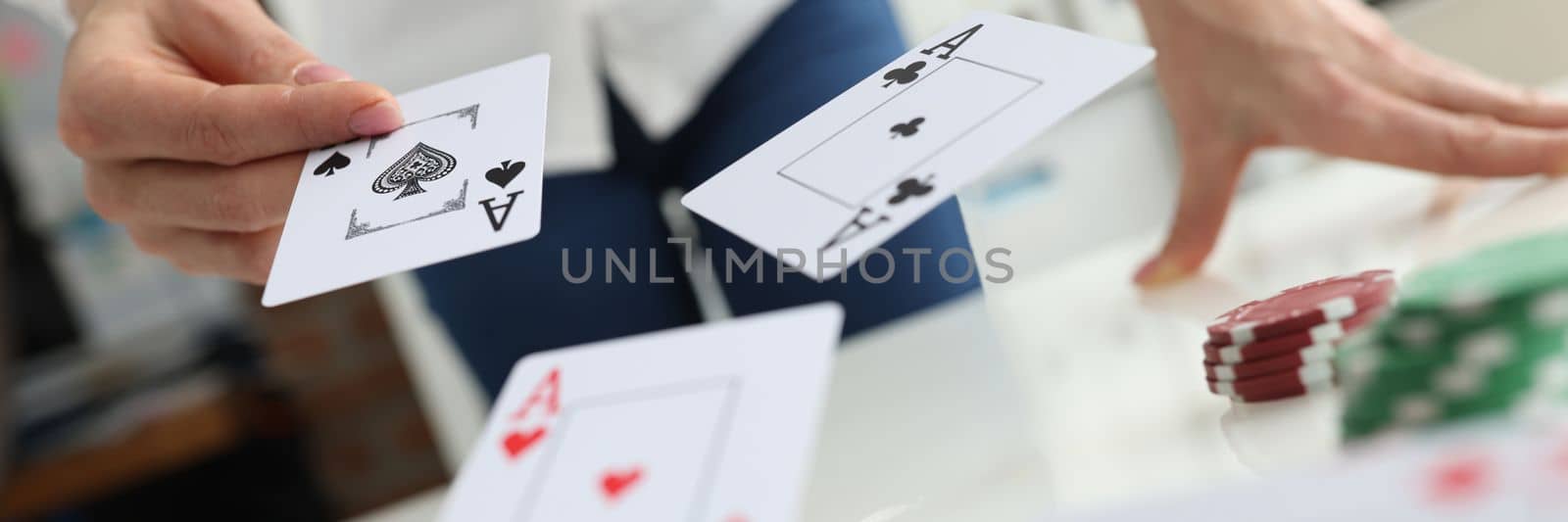 Person throws playing cards on table closeup by kuprevich