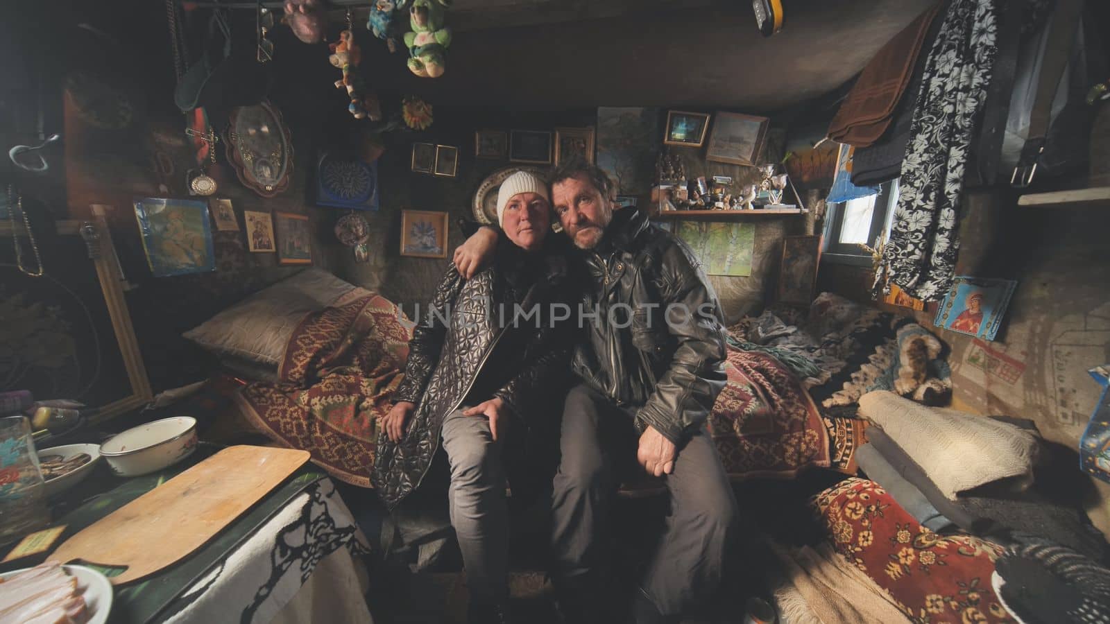 A homeless couple tells a story in their cabin