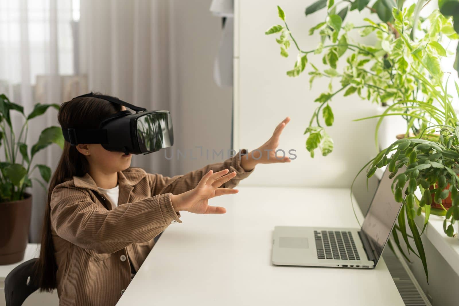 teenage schoolgirls using virtual reality headsets by Andelov13