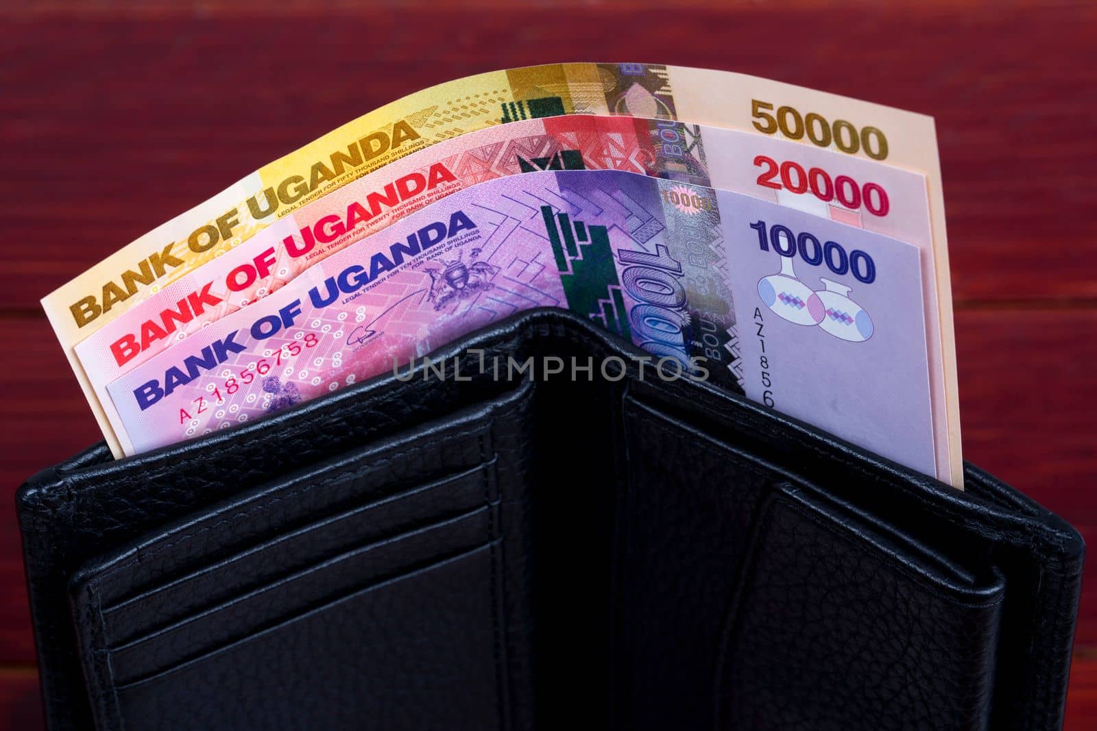 Ugandan money - shilling in the black wallet