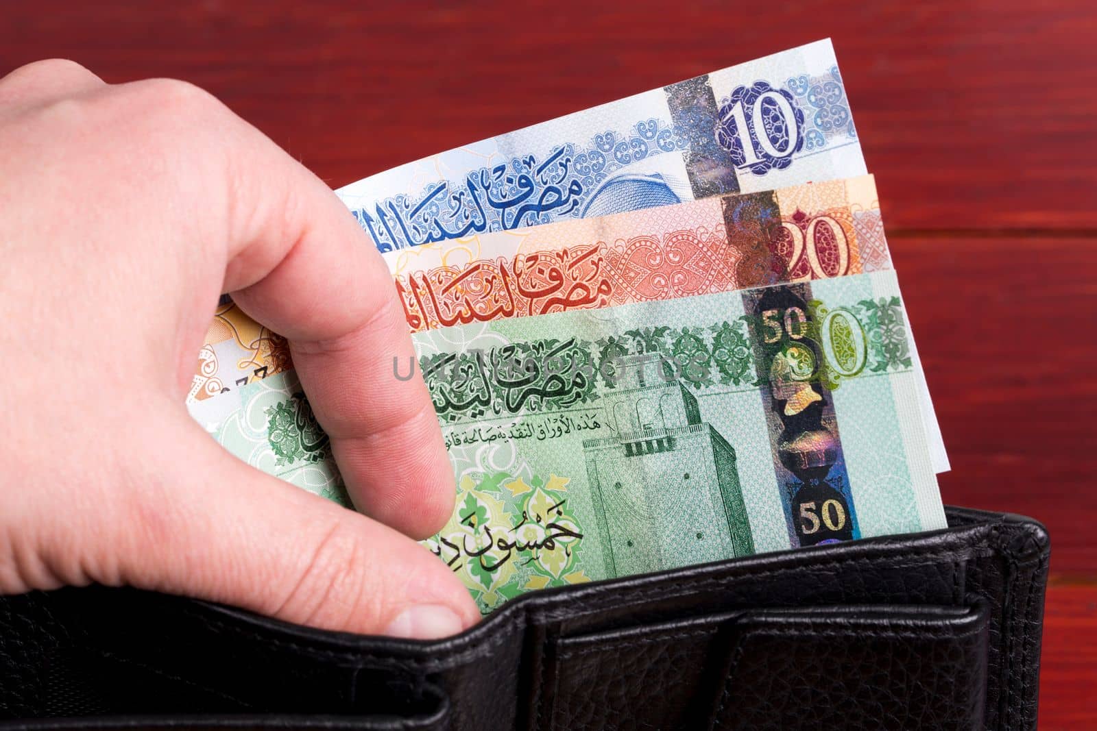 Libyan money - dinar in the black wallet	