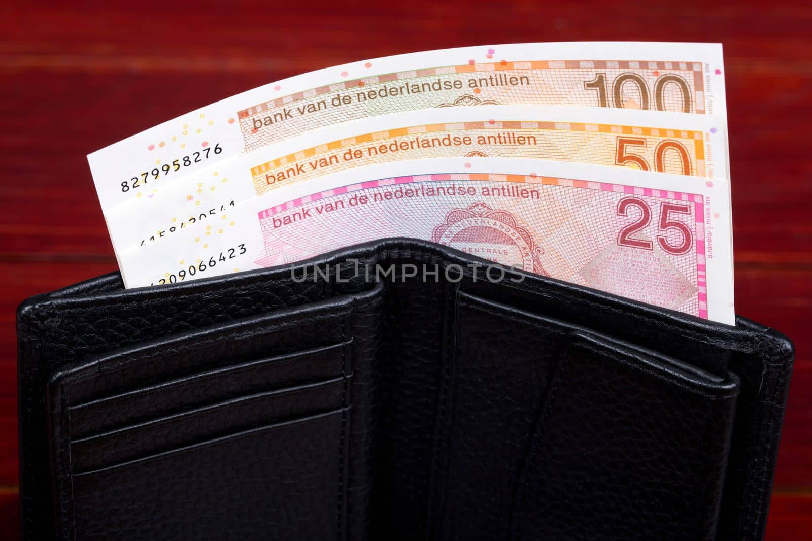 Netherlands Antillean money -  guilder in the black wallet