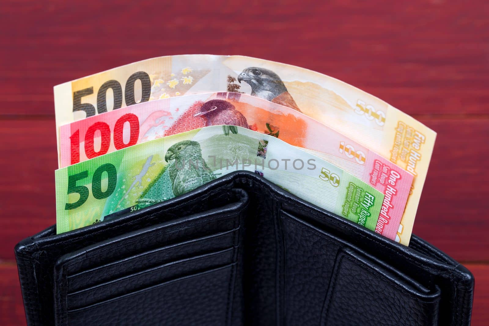 Seychellois rupee in the black wallet