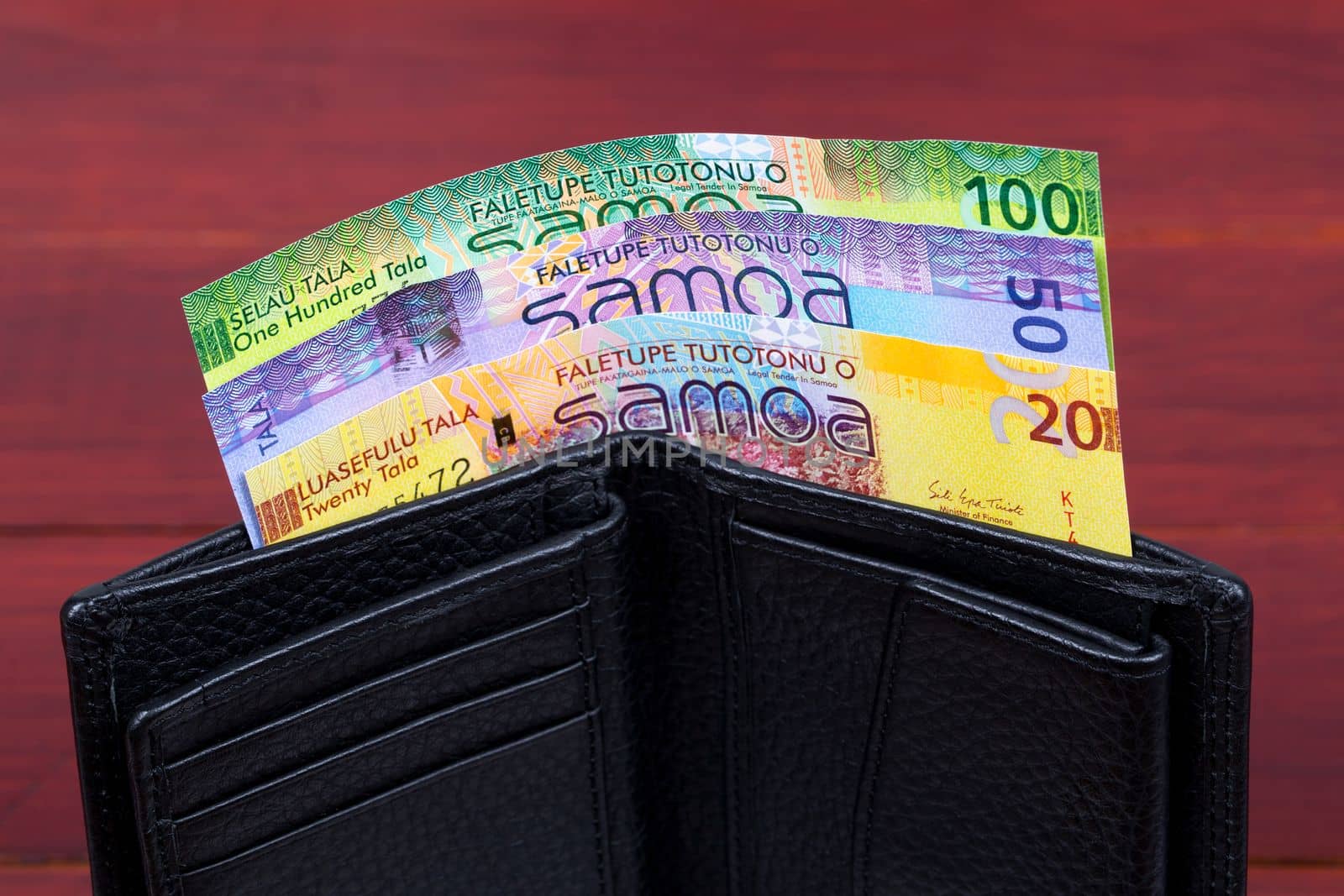 Samoan money - tala in the black wallet