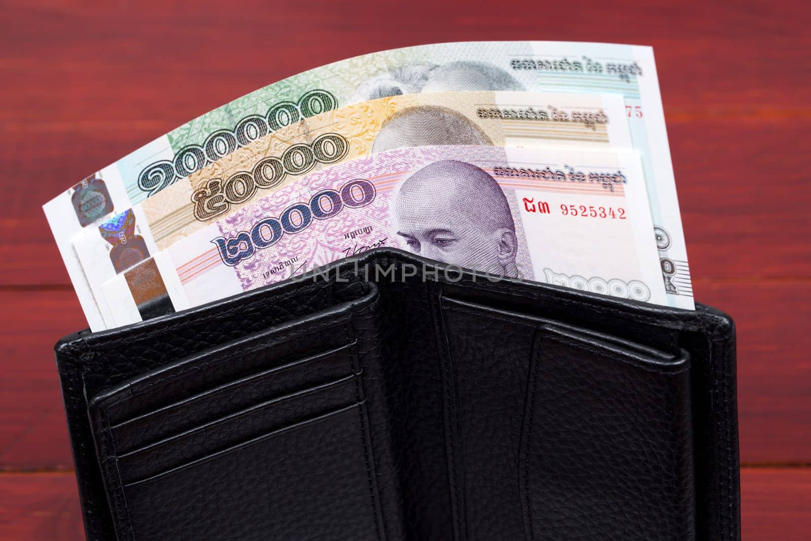 Cambodian money - riel in the black wallet