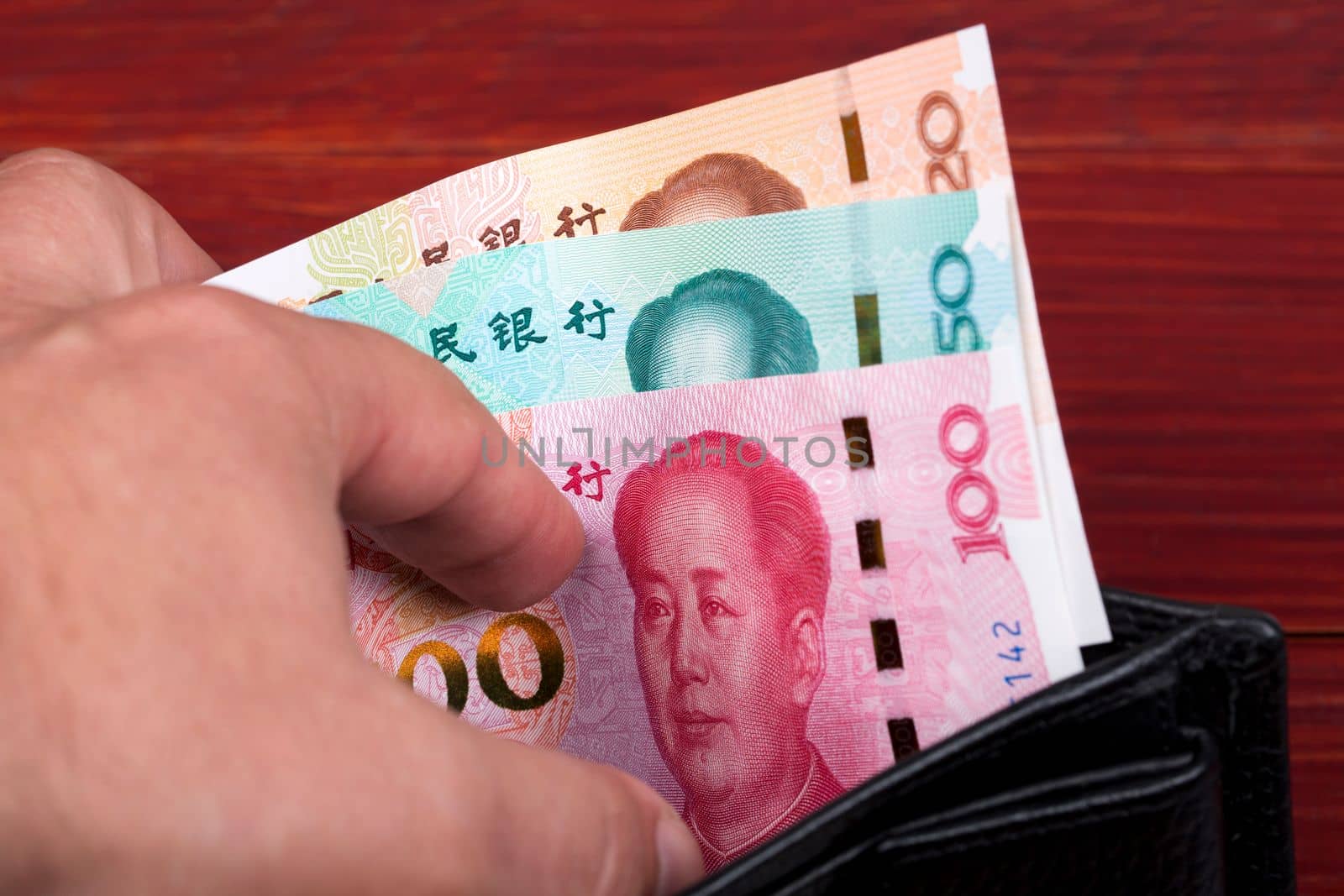 Chinese money in the black wallet