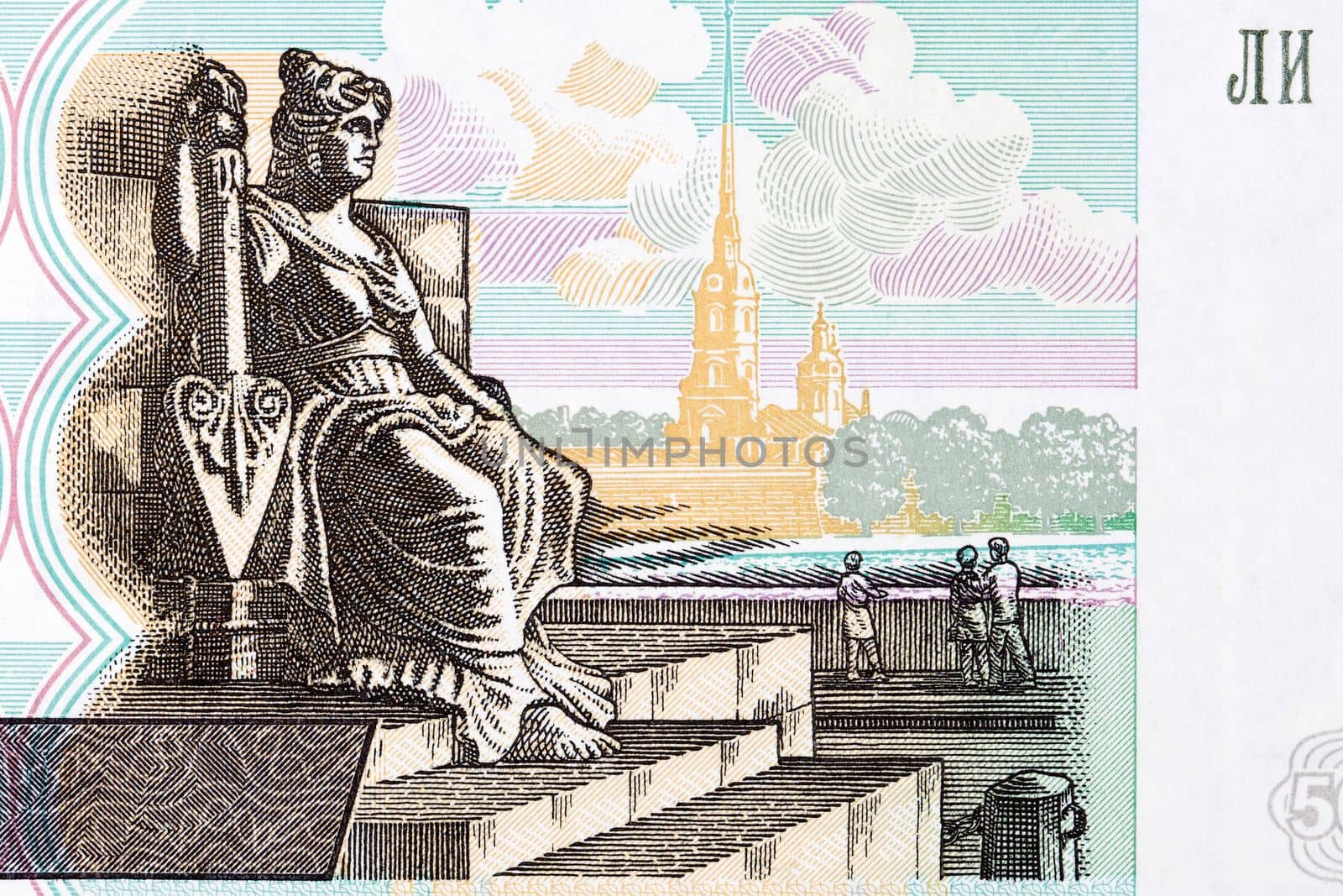 A Rostral Column sculpture on background of Peter and Paul Fortress