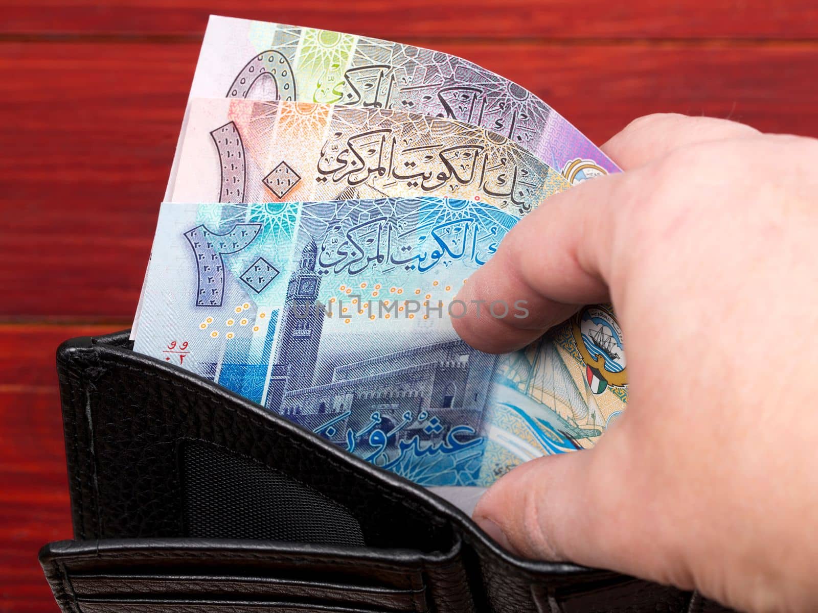 Kuwaiti money - Dinar in the black wallet