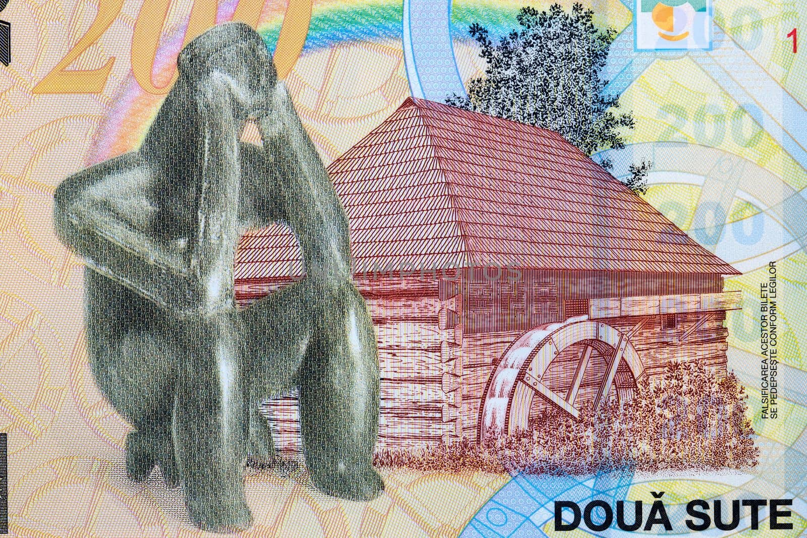 A watermill and The Hamangia Thinker from Romanian money - Leu