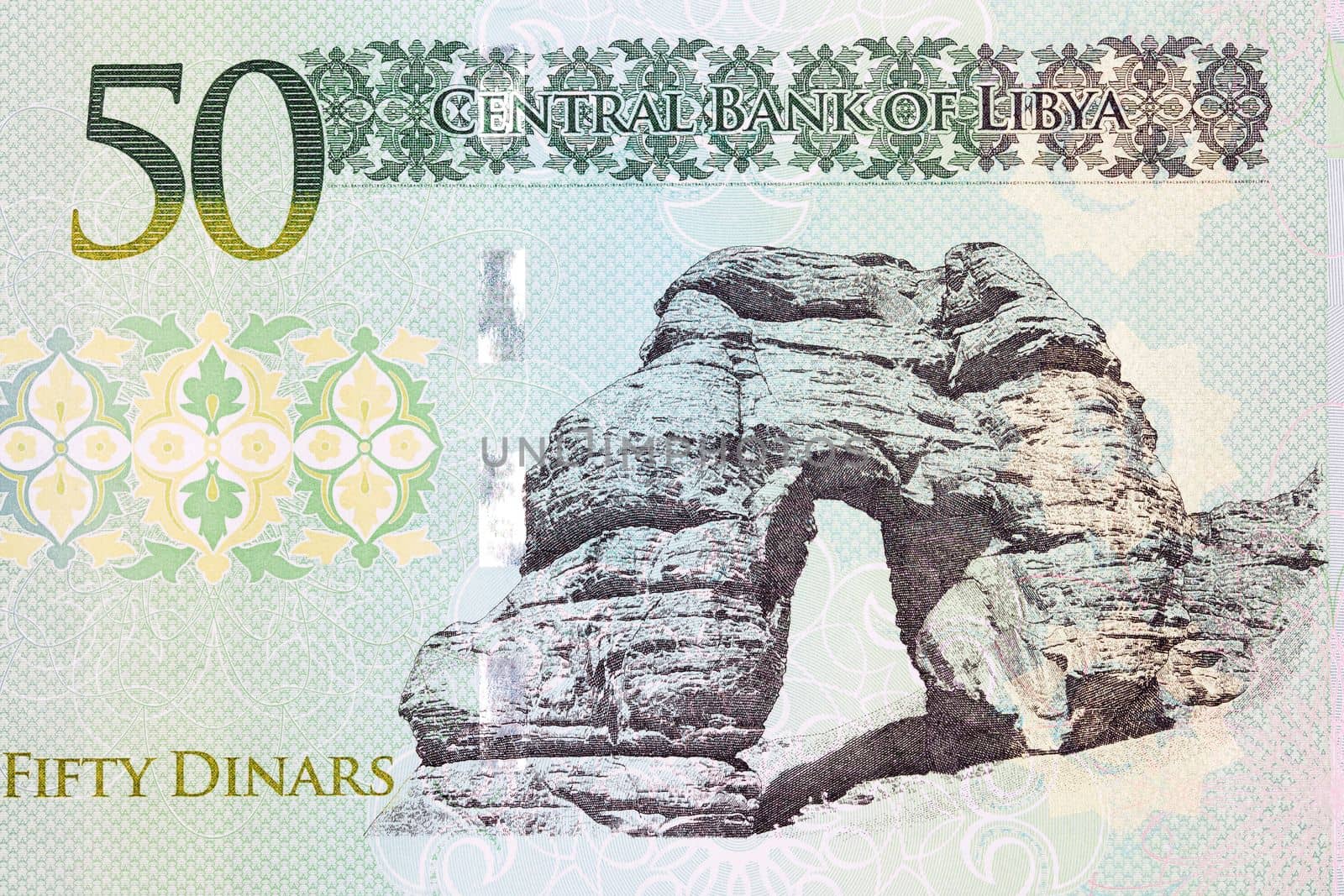 Stone arch in Tadrart Acacus from Libyan money - Dinars