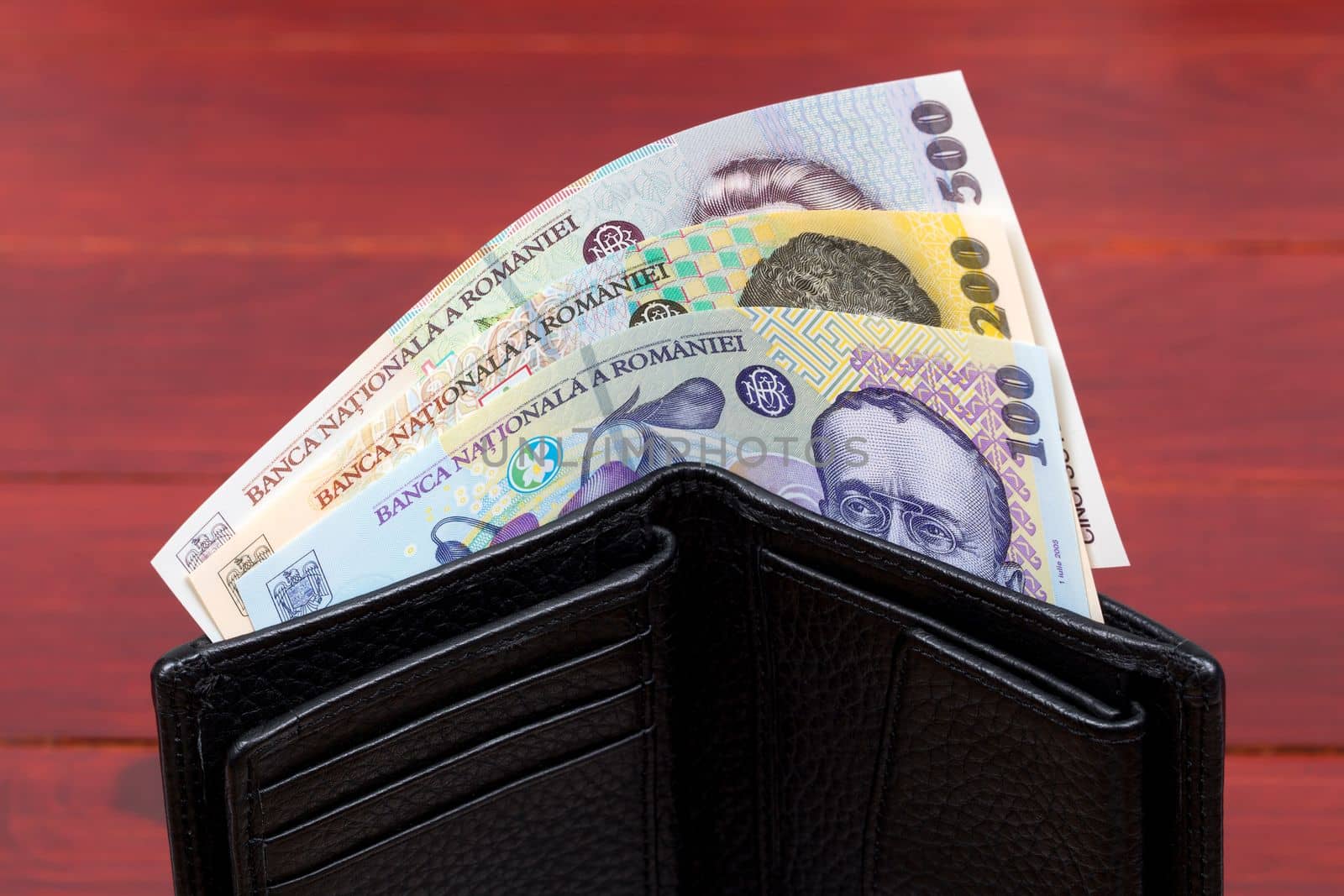 Romanian money - leu in the black wallet by johan10