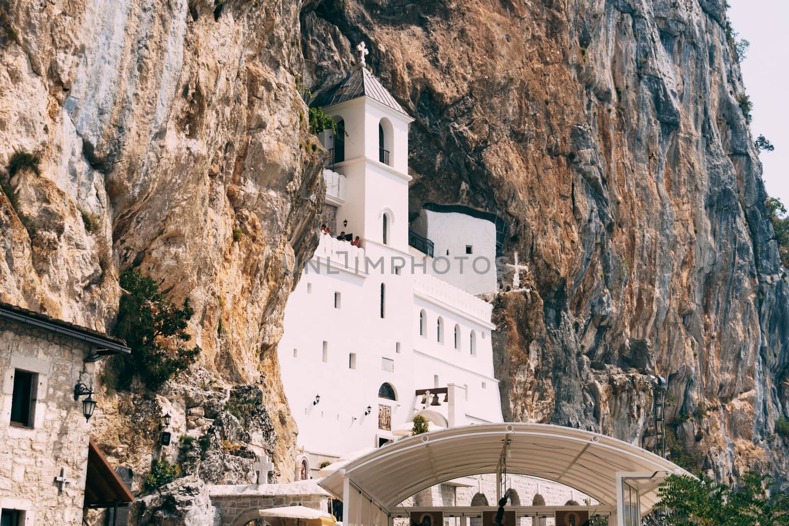 Facade of the Ostrog monastery in the rock. Montenegro. High quality photo